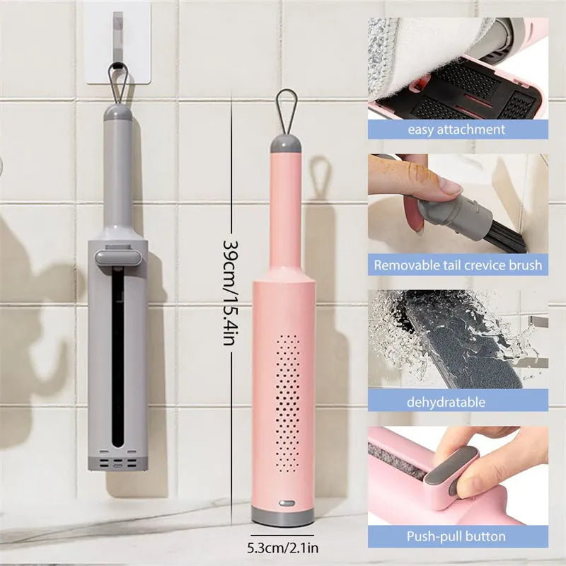 Rotatable self-squeeze mini flat mop with crevice brush and pink microfiber pad, shown extended to 19.3 inches.