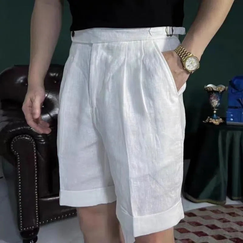 Men's linen blend double waist cuffed shorts in white, side view showing cuffed hem and relaxed fit