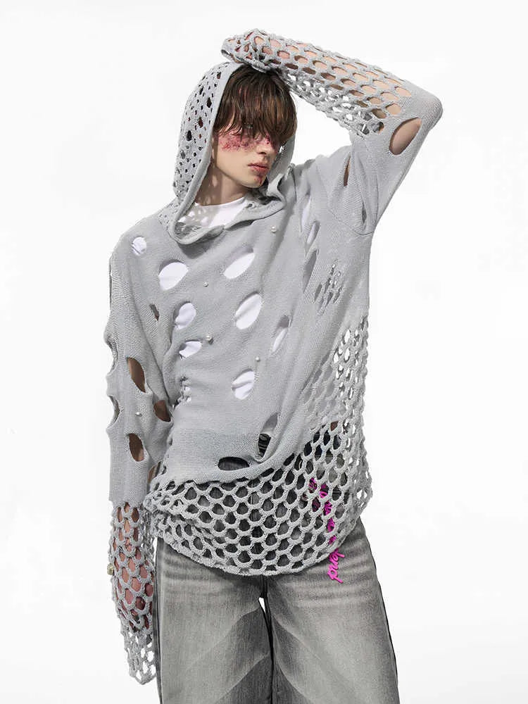 Black men's loose hoodie with pearl bead trim detail on the front of the hood.