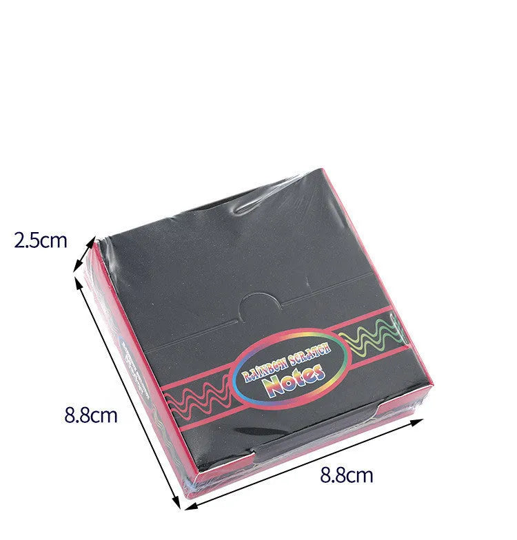 Colourful trumpet scratch art kit for children showing the design on the paper and the full presentation box.