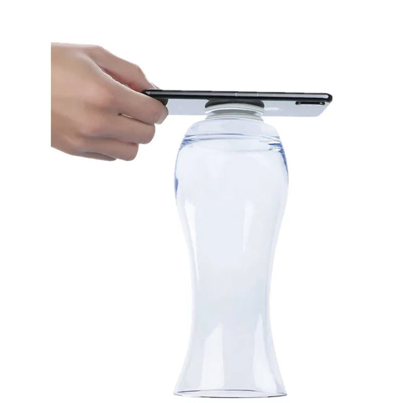 Transparent circular and square silicone nano gel adhesive pads on a smooth surface