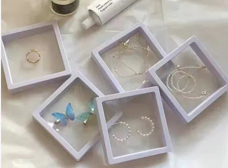 Handmade women's Hetian Jade Rabbit bracelet with glass rabbit charms in a gift box.