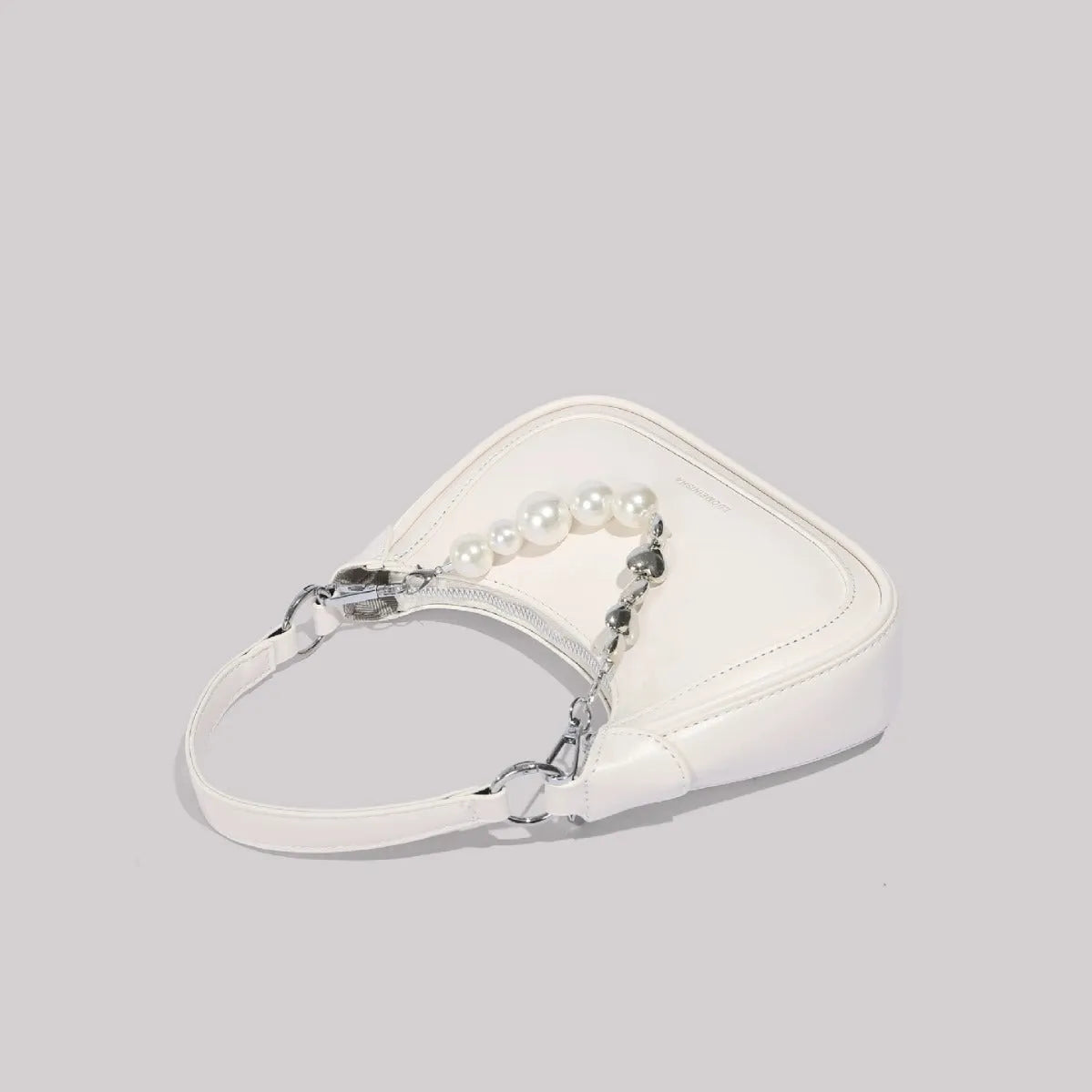 White PU crossbody bag vertical square shape with sewing line detail and three-dimensional outer pocket