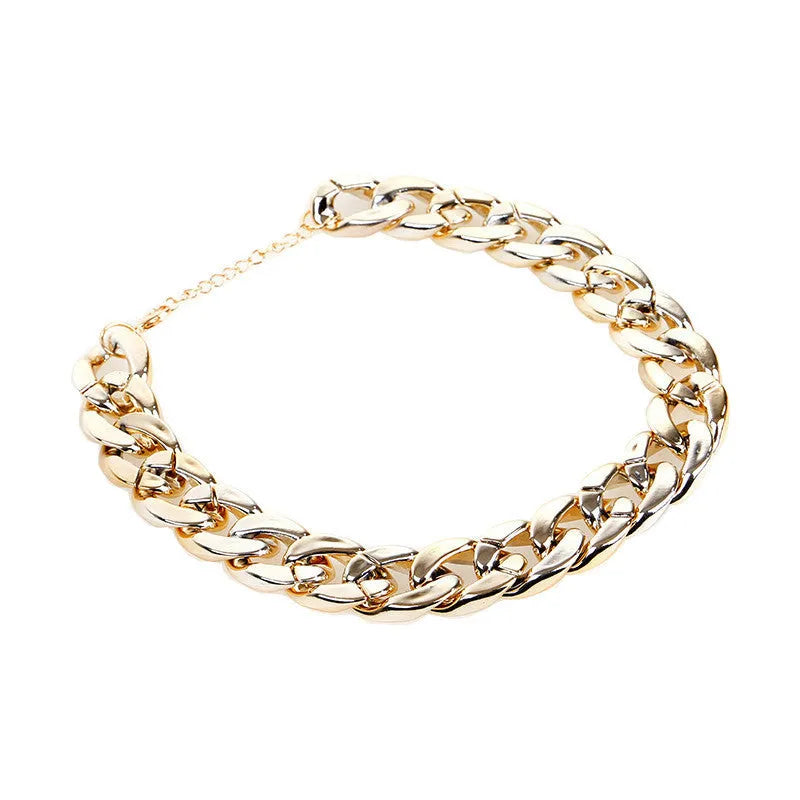 Geometric plastic resin dog collar chain necklace in gold or white on a small dog model
