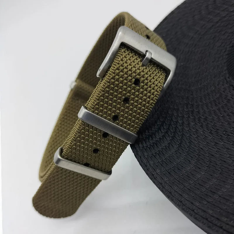 Nylon integrated watch strap in Army Green colour, shown next to Black, Deep Khaki, Light Gray, and Sapphire Blue options.