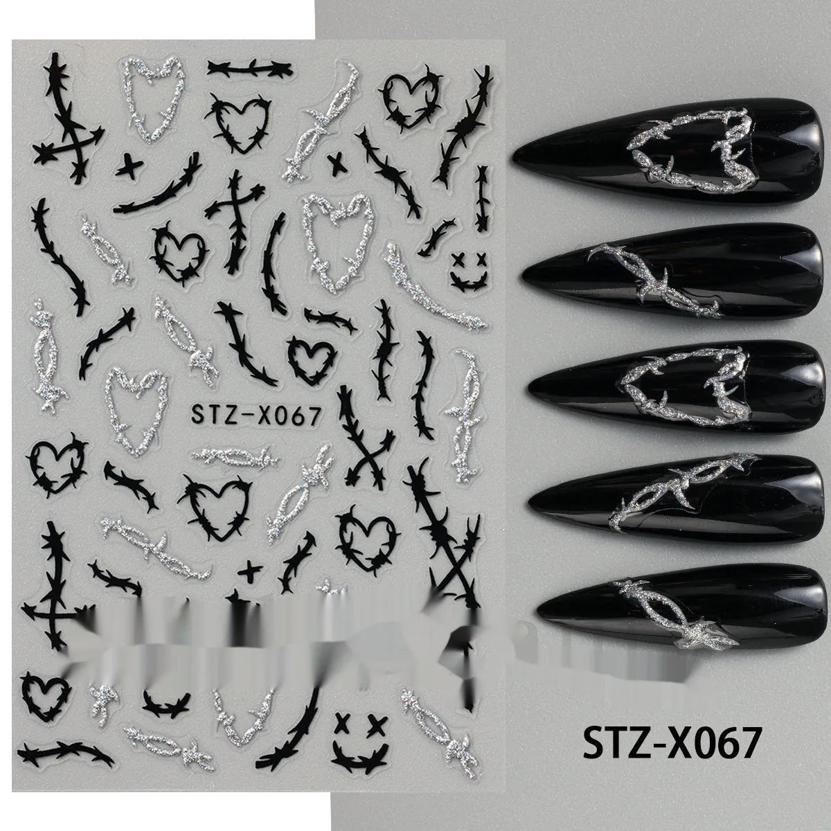 Black and silver stripe nail art sticker with a love pattern design on a plastic sheet.