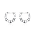 A pair of sterling silver retro geometric earrings with round elements and electroplating.