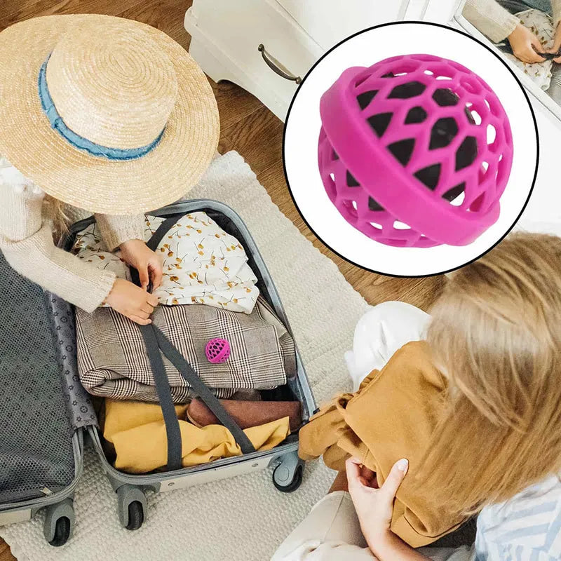 Bag cleaning ball in pink, white, and black – reusable sticky cleaner for backpack and purse debris