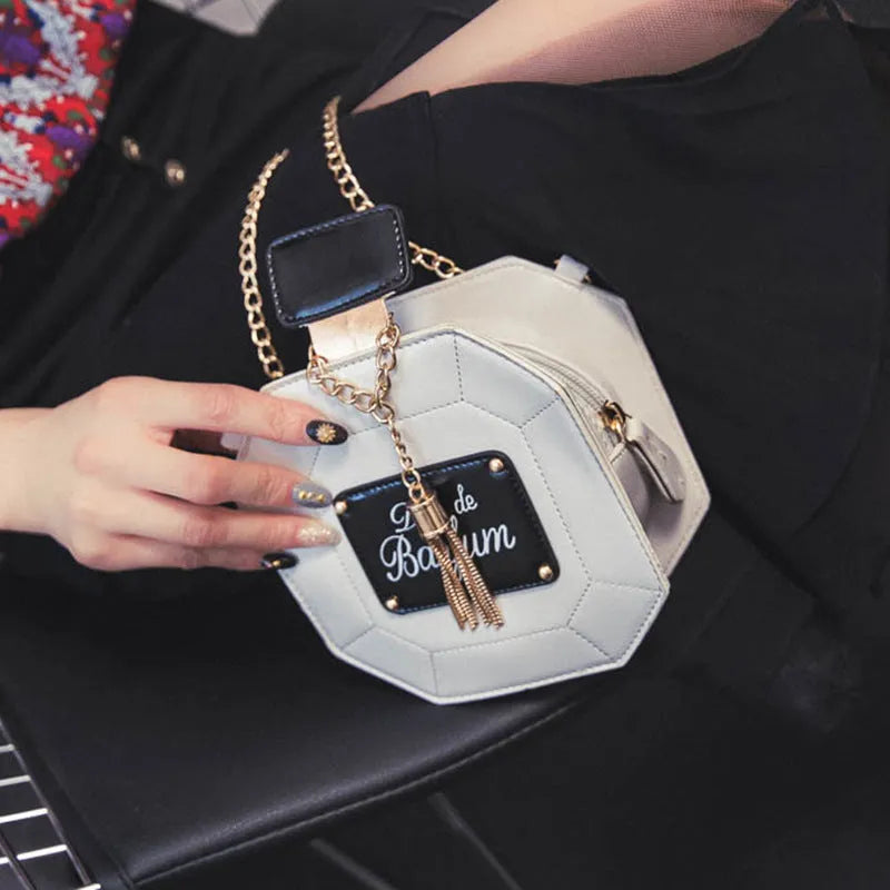 Mini chain crossbody bag for women, round PU leather shoulder bag with printed letter pattern and zipper closure
