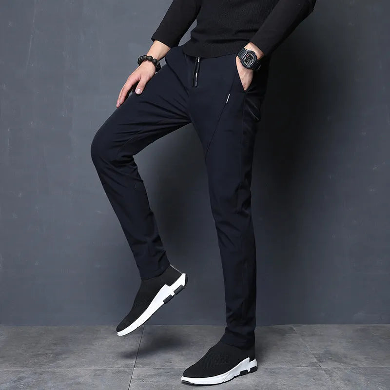Men's plain polyester sports trousers with velvet lining, black, loose fit, small trouser mouth, non-iron