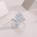 Wedding ring set with 1 carat round moissanite stone in S925 silver with platinum plating on white background