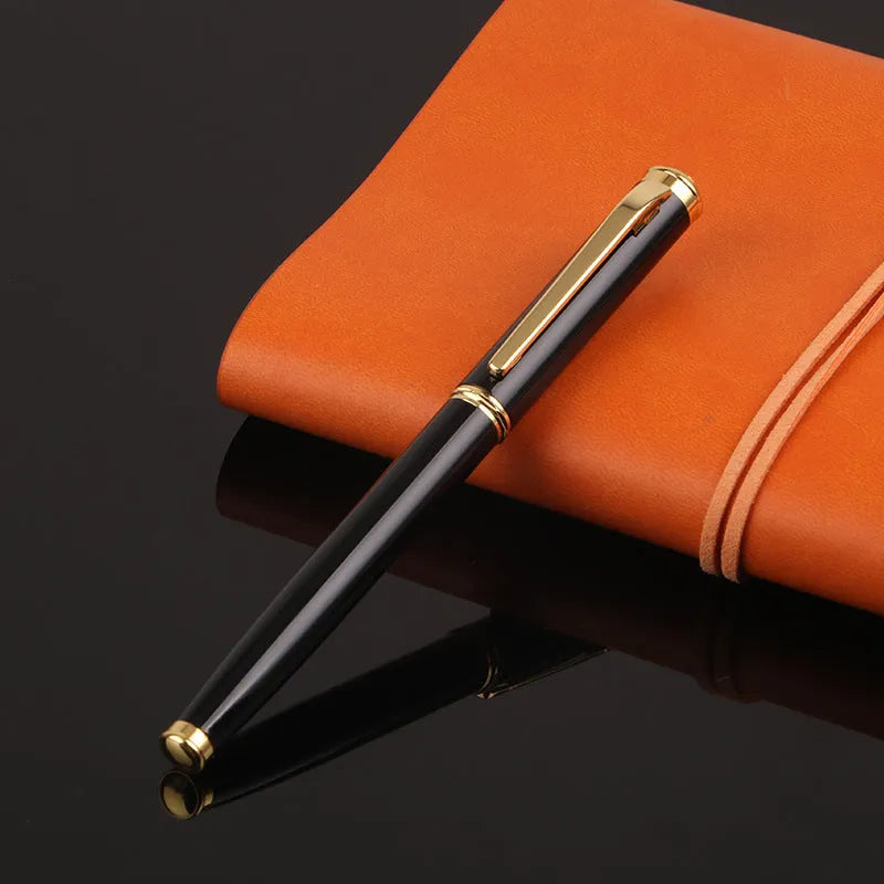 Metal ink pen with 0.5mm Yijin NIB in black colour, lying horizontally on a white surface