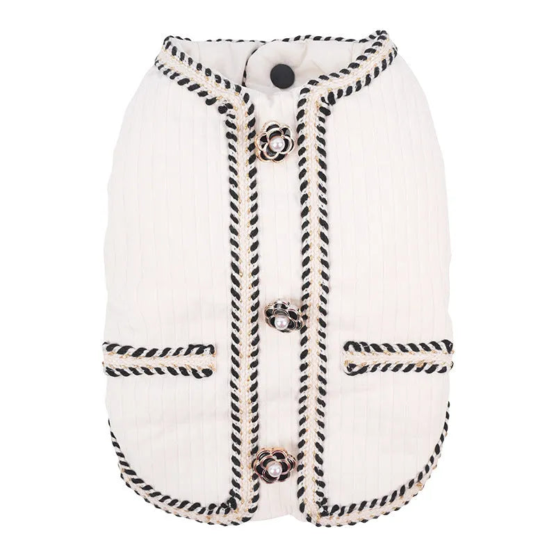 Cartoon-style quilted dog coat in light purple on a small dog.