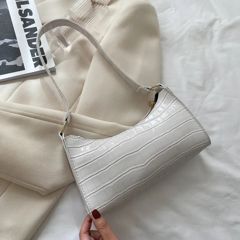 Small women's underarm shoulder bag with crocodile pattern, PU material, and zipper closure in beige