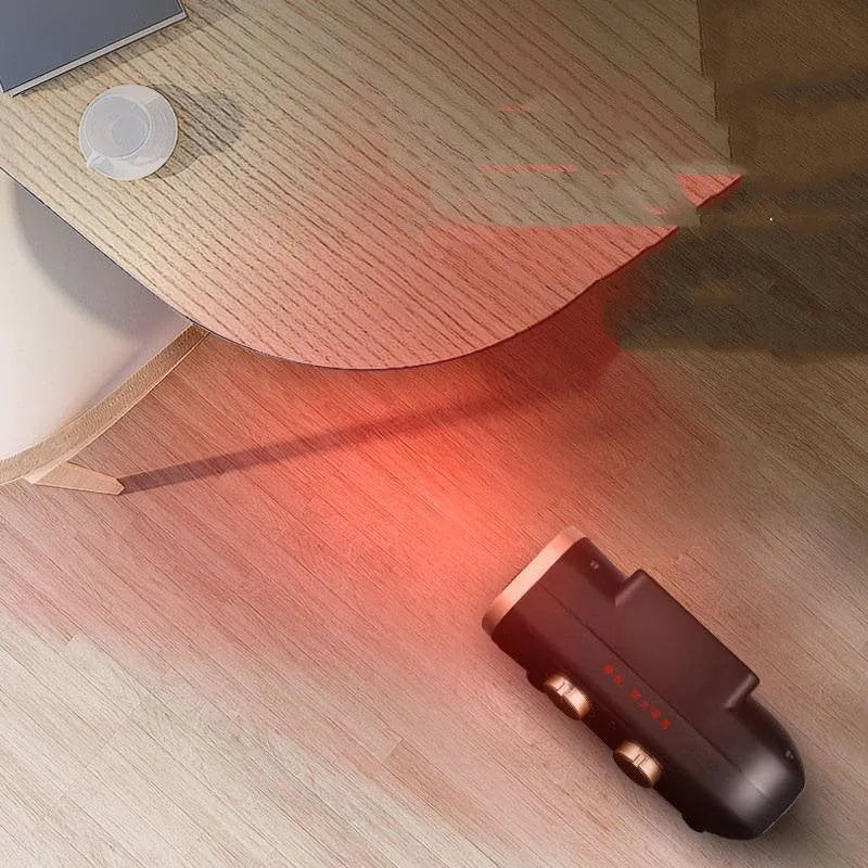 White and black gold electric fan heater with mechanical control dials on the front.