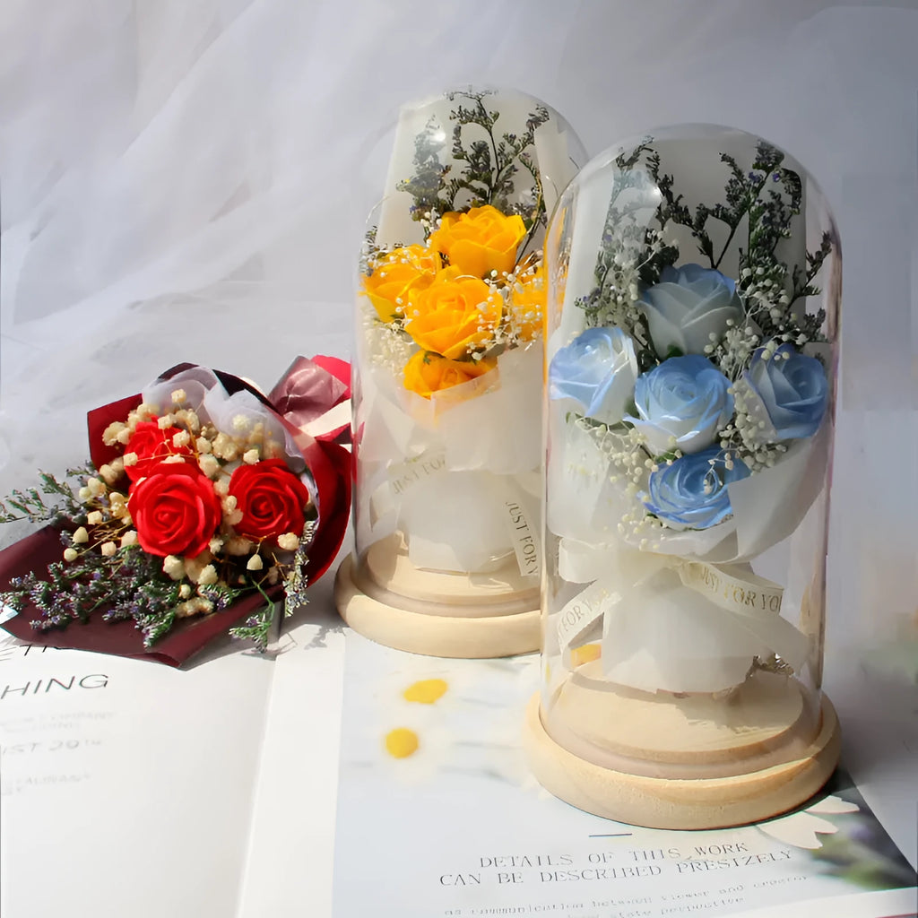 Dried flower and soap flower bouquet under glass dome on wooden LED base, available in multiple colours including Aisha Pink and Light Purple
