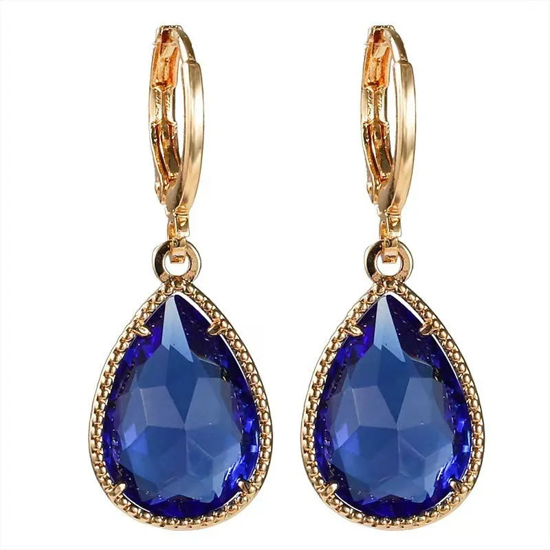 Geometric glass water drop earrings with carved Saturn design in multiple colours