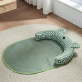 Green and yellow reversible dog cooling mat showing both sides, with size options S M L XL.