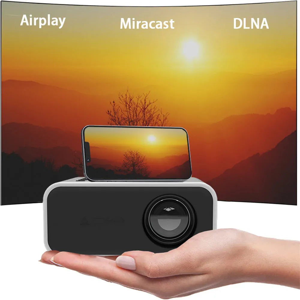 YT300 black or white portable mini projector with remote control on a table