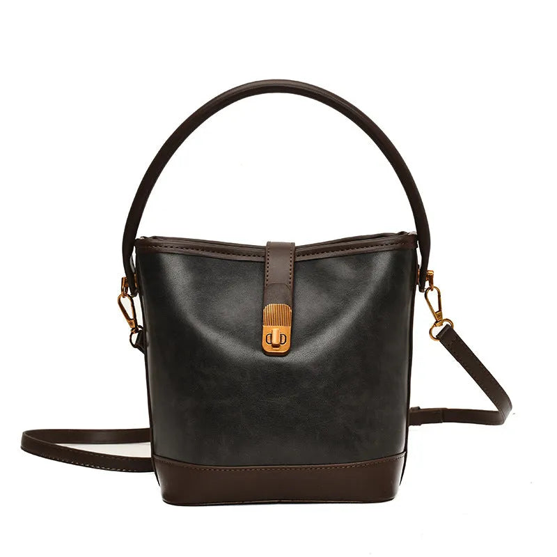 Women's PU handbag in simple style available in black, brown, and coffee colours in large and small sizes