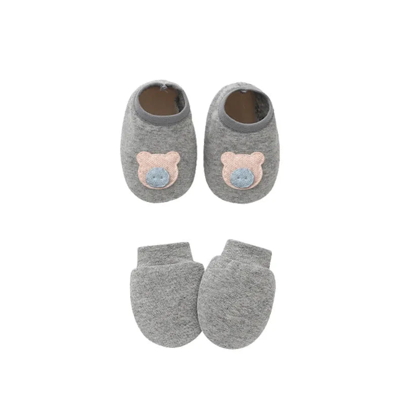 Cotton baby gloves and foot cover set in multiple colours including light blue, navy blue, pink, and camel