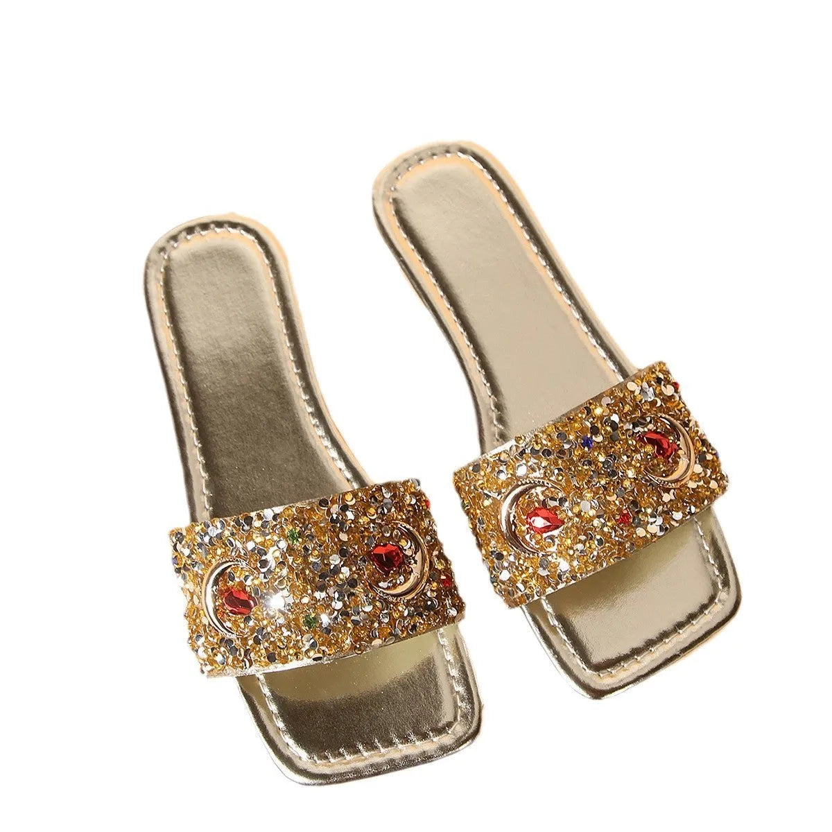 Gold women's flat slippers with rhinestone and sequin decoration on the upper.