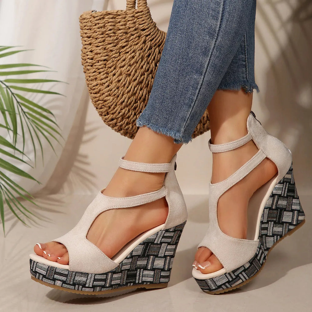 Women's cream white thick-soled ankle-strap buckle sandals with cloth upper and rubber sole.