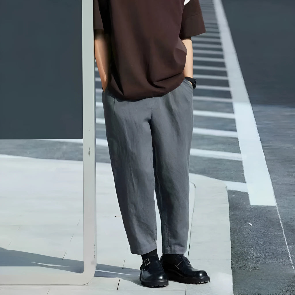 Men's loose straight casual pants in beige colour with drawstring waist detail for summer wear