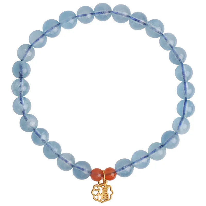 Women's ice translucent aquamarine crystal bracelet with 8mm round beads and blessing card detail