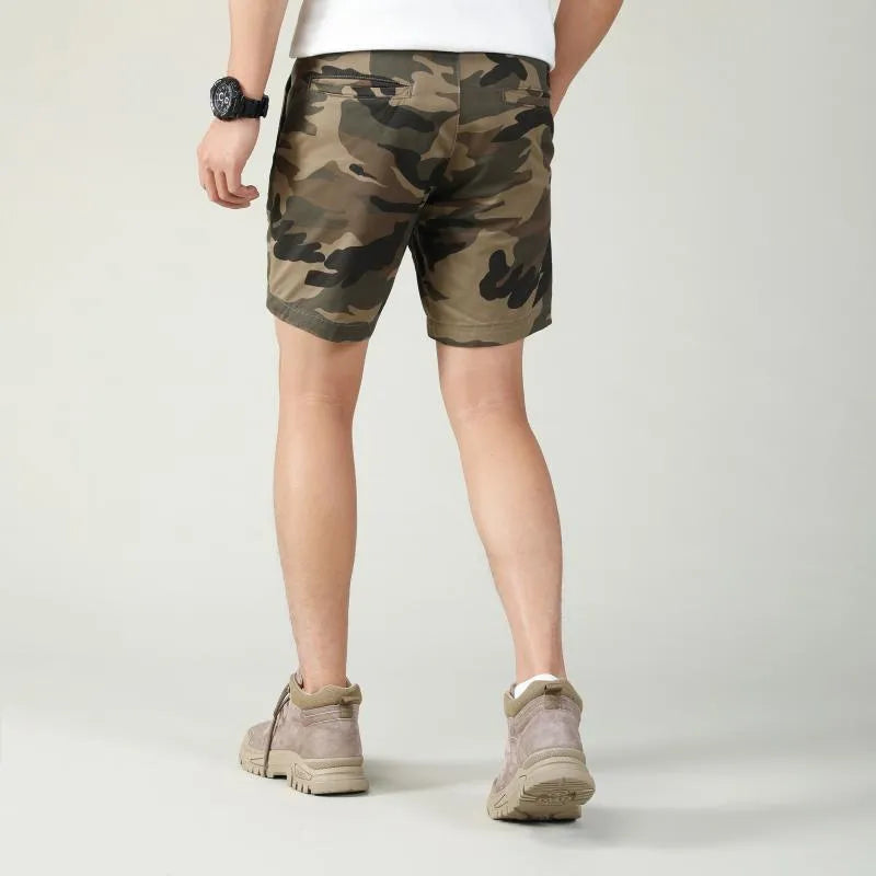 Cotton camouflage work shorts with mid-waist design and zip fly closure