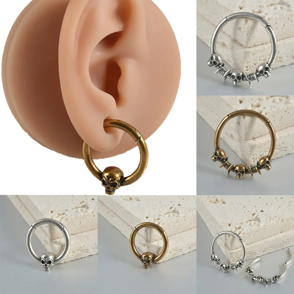 Copper punk earrings with ghost head designs in antique gold and silver vintage finish
