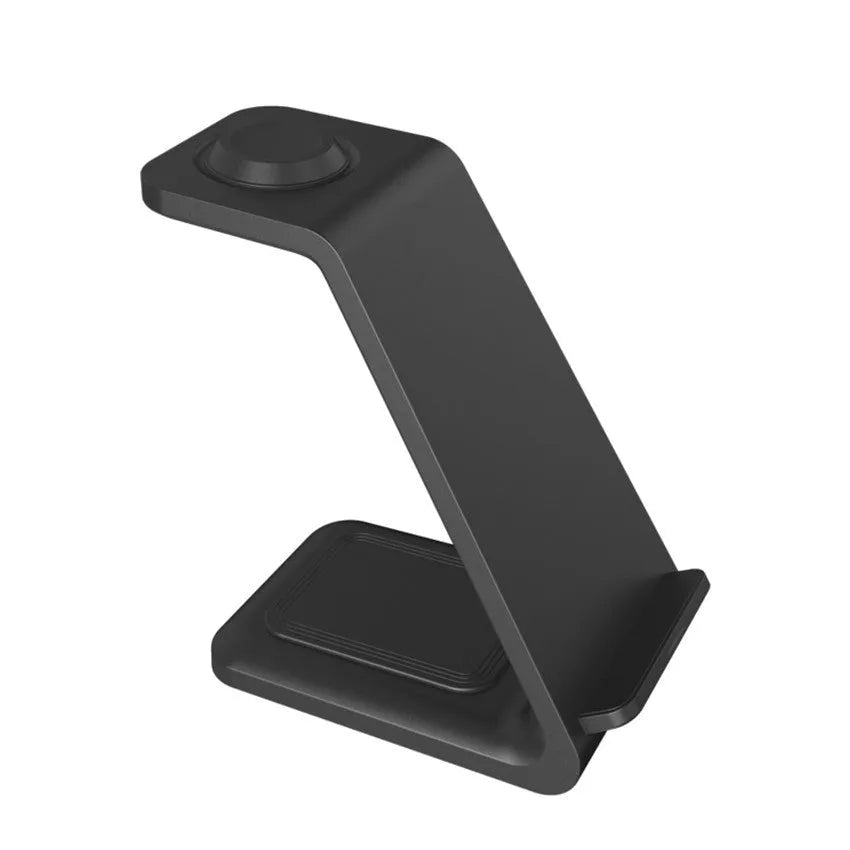 White 3-in-1 upright wireless charger and phone holder on a desk with a mobile phone charging.