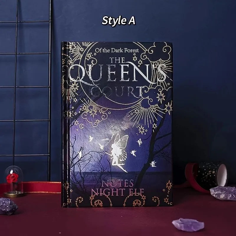 Blue A5 notebook with luminous hardcover showing night elves illustration, open to reveal full-colour printed pages
