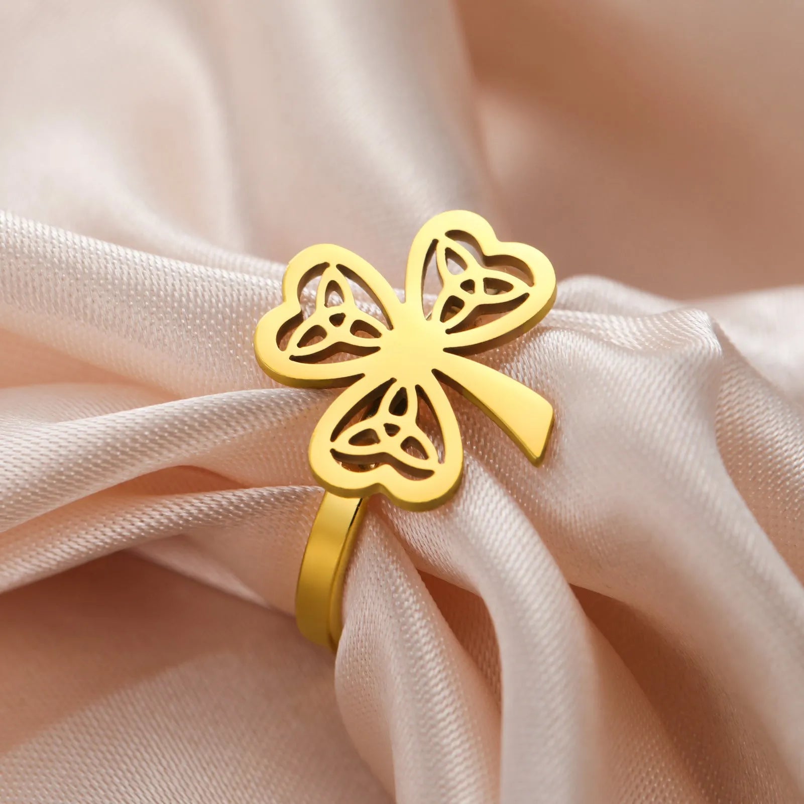 Stainless steel hollow fashion ring in gold or steel finish