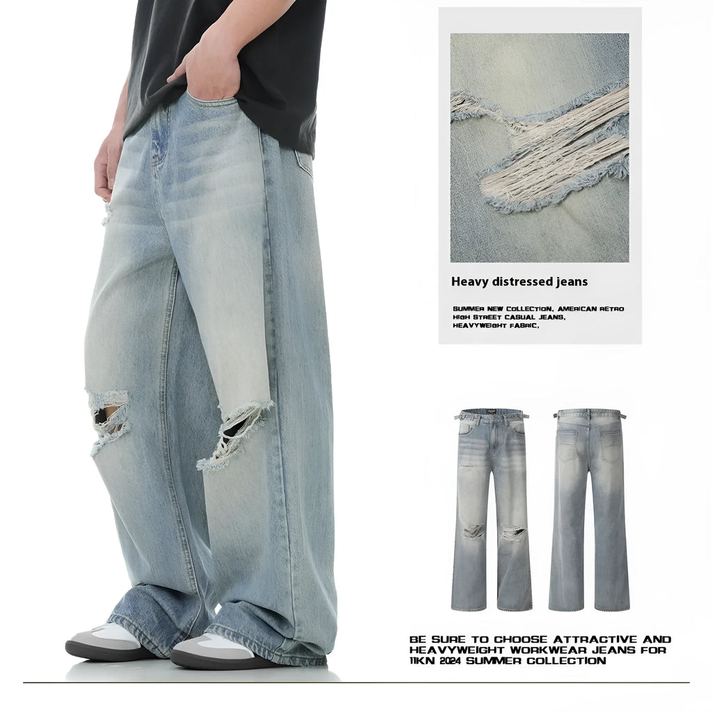 Blue cotton blend men's straight leg jeans with retro ripped detailing, front view, zipper fly, standing pose