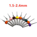 Ten tungsten carbide PCB drill bits with straight shanks on a white background