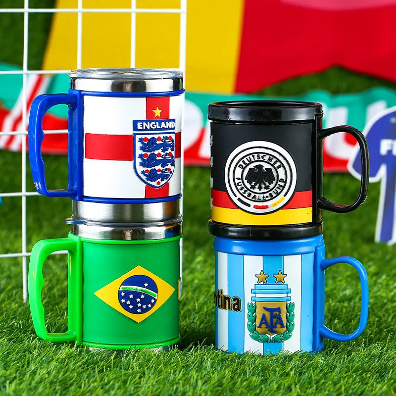 World Cup soccer mug souvenir in team colours, rubber and metal construction, 7.6cm diameter