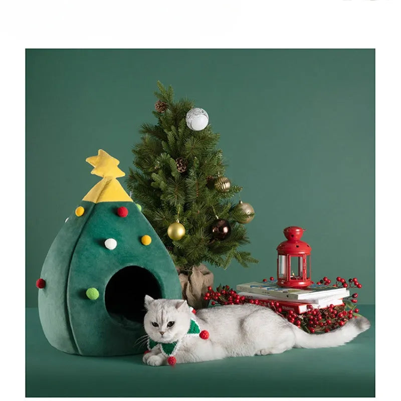 Red Christmas tree-shaped plush cave bed for cats and small dogs on a white background.