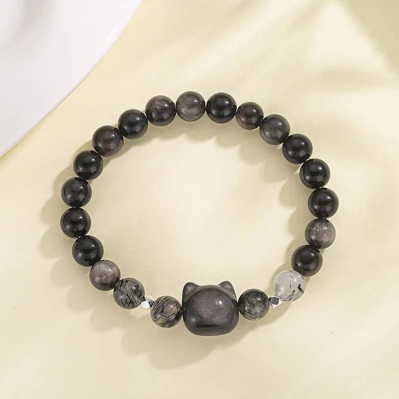 Silver obsidian cat bracelet with engraved design and electroplated finish