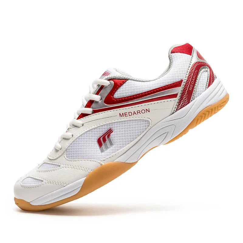 White and blue unisex table tennis training sneaker with lace-up front and rubber sole.