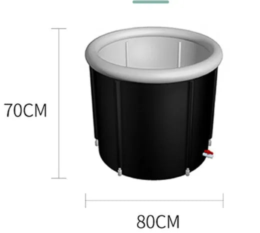 Black inflatable portable ice bath tub with weather lid, shown outdoors.