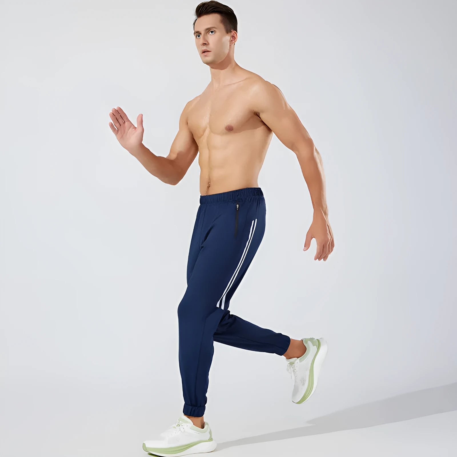 Men's black polyester running trousers with mid-waist design for exercise and leisure activities
