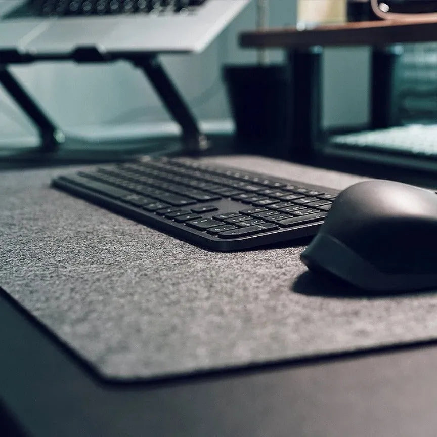 Thickened non-slip felt mouse pad in brown, extra large size, on a desk with a mouse and keyboard