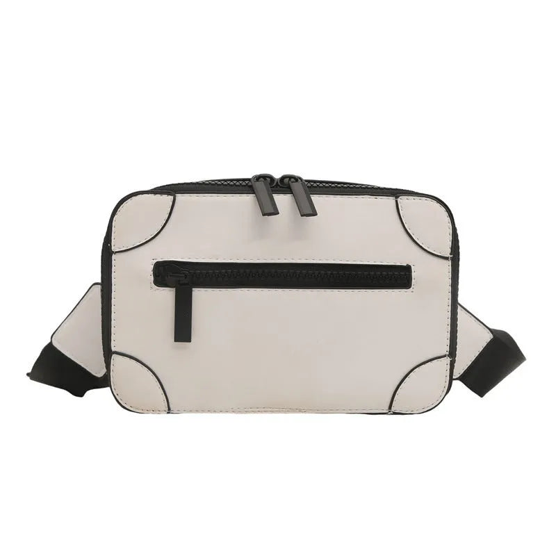 Women's black square crossbody bag showing internal mobile phone pocket and adjustable shoulder strap