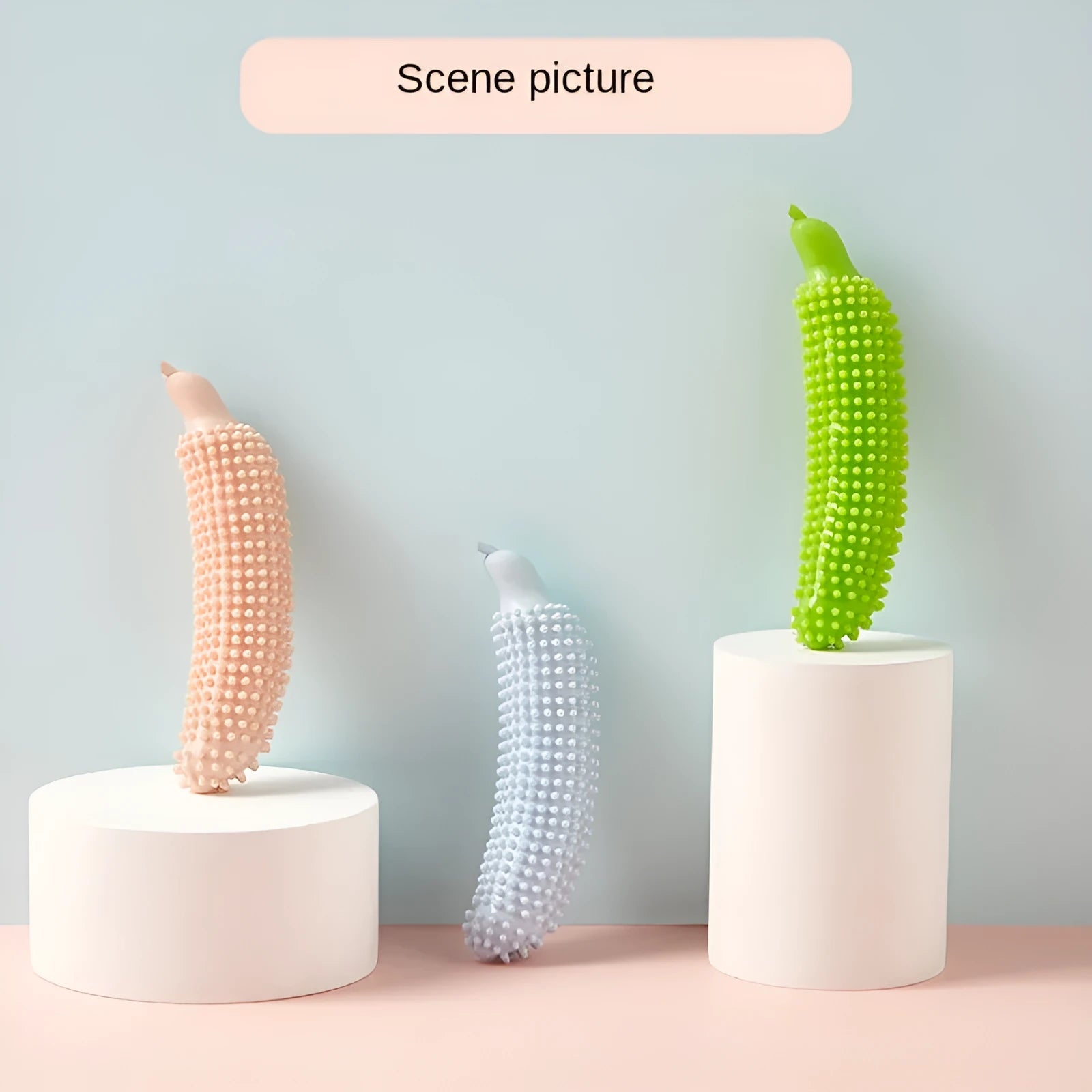 Cucumber-shaped dog teething toy in green, pink and purple colours for bite-resistant chewing and training