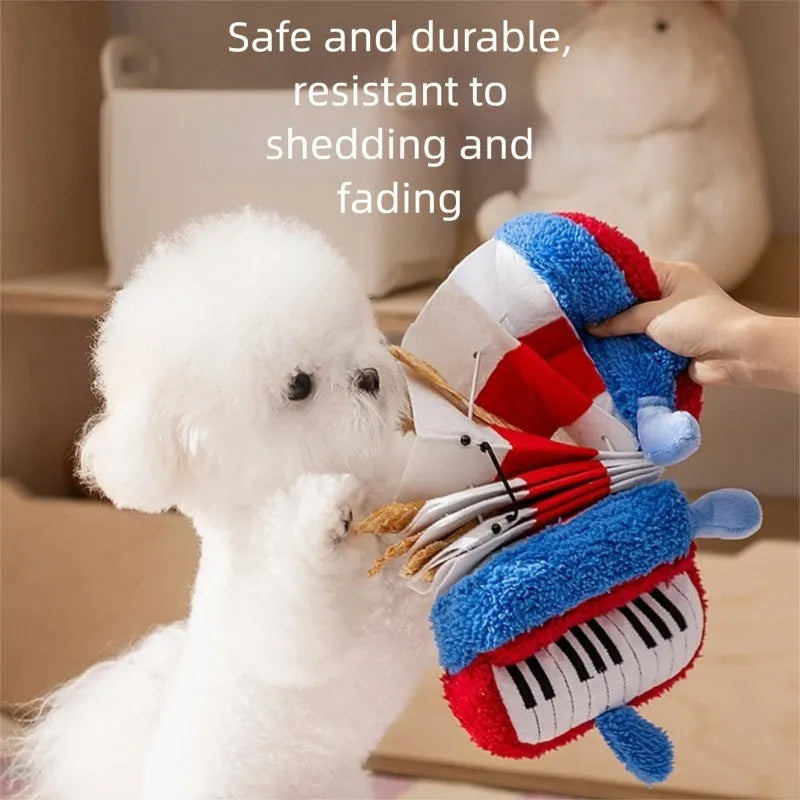 Blue accordion dog squeak toy with food hiding compartment on white background