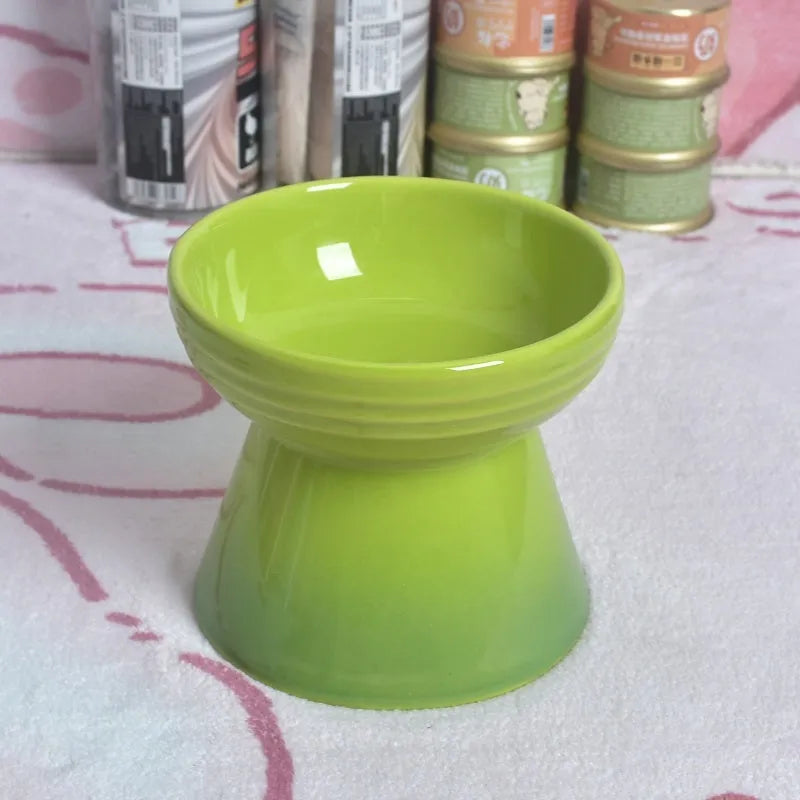 Black ceramic pet bowl with a high foot and neck protector to prevent tipping, shown with flat and slanted rim options.