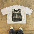 A man's printed short-sleeve cotton T-shirt in a retro street style with a drop-shoulder design.
