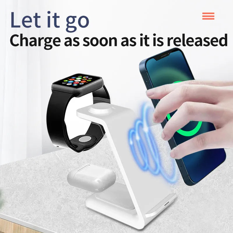 White 3-in-1 upright wireless charger and phone holder on a desk with a mobile phone charging.
