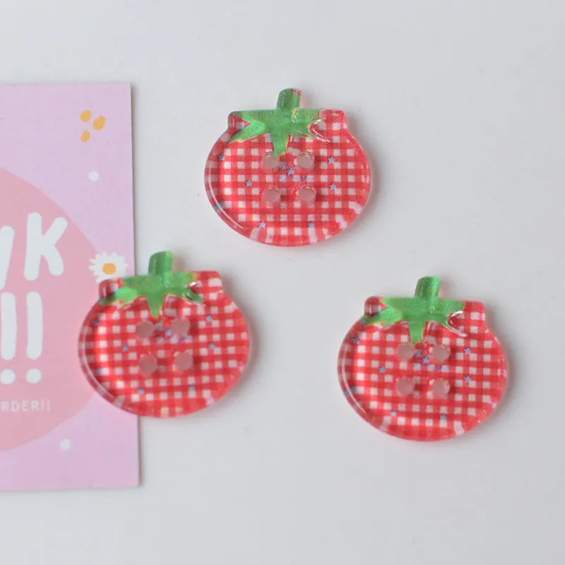 Plastic tomato button ornaments in cherry tomato printing, red plaid, solid red, and mixed colour designs